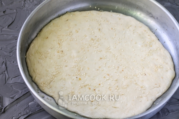 Посыпать кунжутом