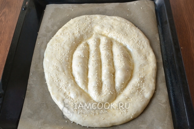 Посыпать кунжутом