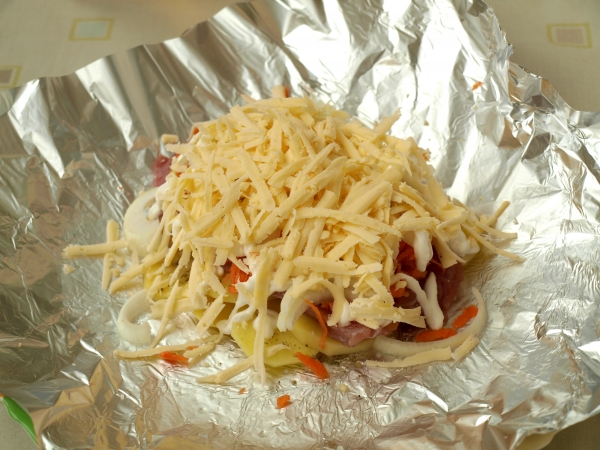 Посыпать сыром