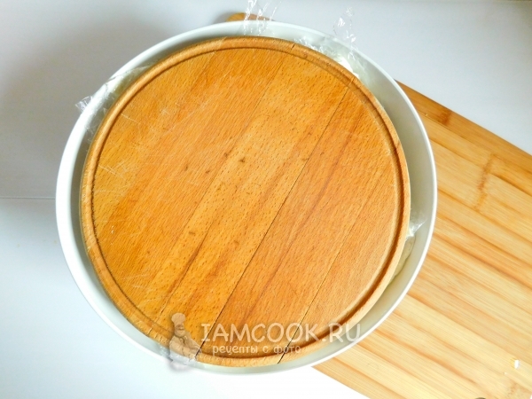 Положить гнет