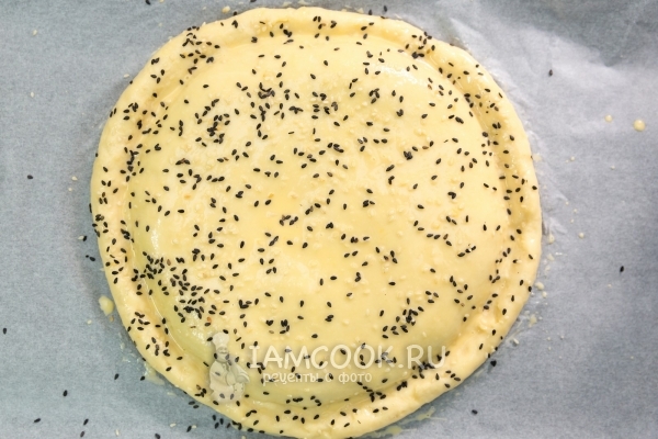 Посыпать кунжутом