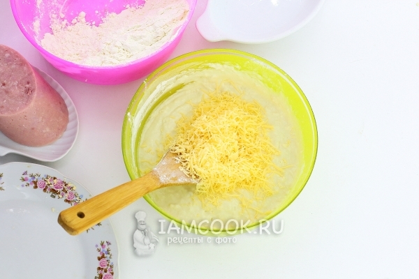 Добавить тертый сыр