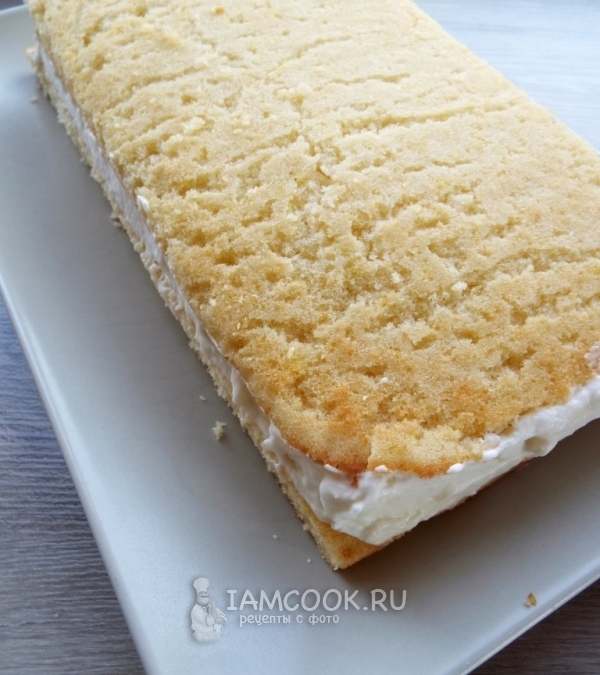 Положить на крем бисквит