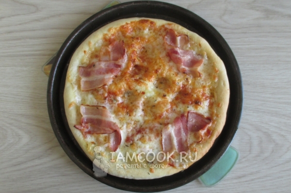 Поставить пиццу в духовку