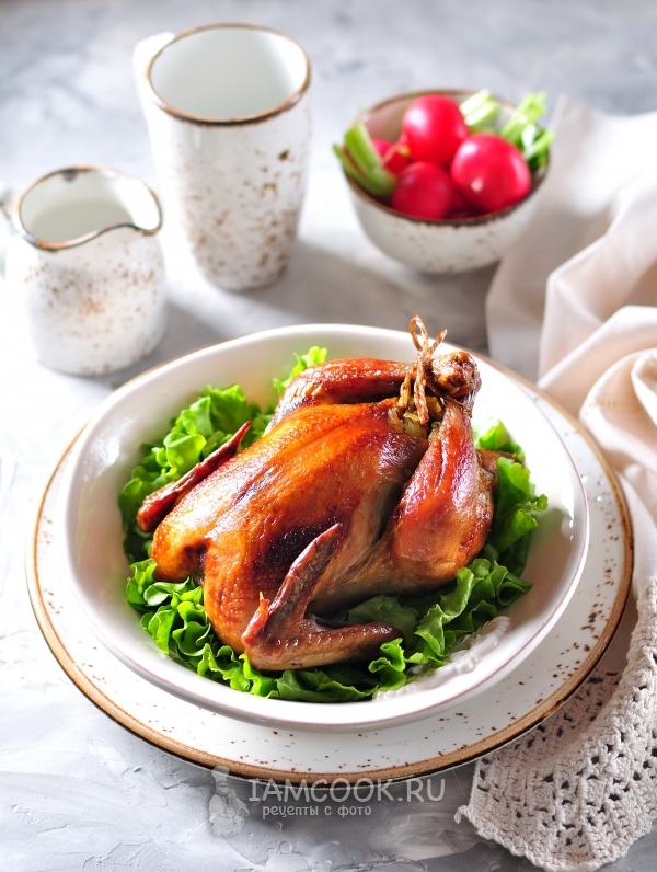 Фото курицы, фаршированной рисом, в духовке