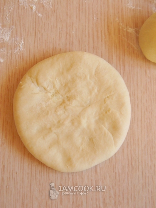 Сплюснуть лепешку руками