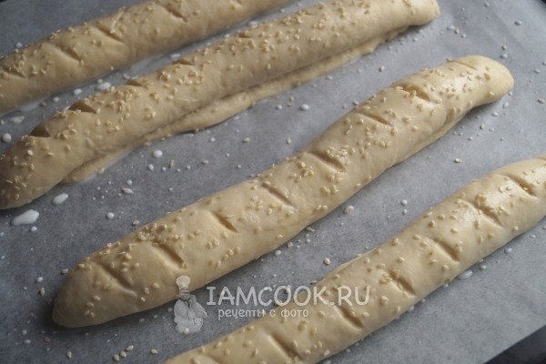 Посыпать кунжутом