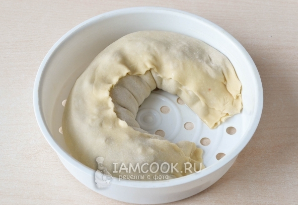 Положить ханум в форму для пароварки