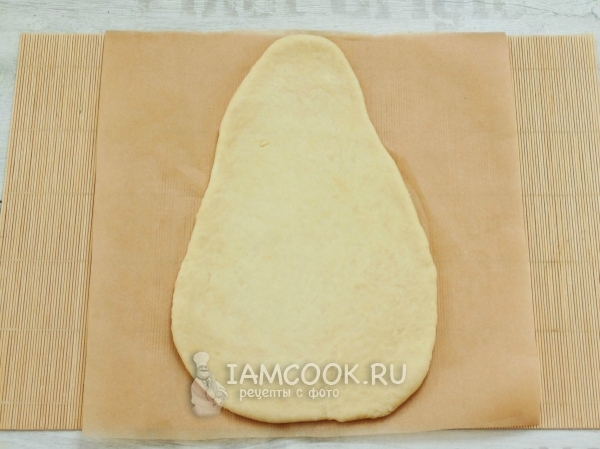 Раскатать тесто в форме головы