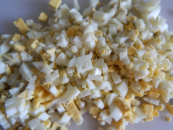 Яйцо порезанное