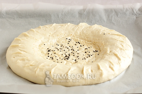 Посыпать кунжутом